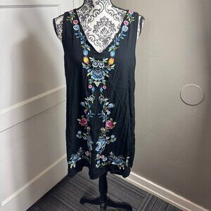 The Cove black v-neck embroidered sleeveless mini dress.  Boho casual